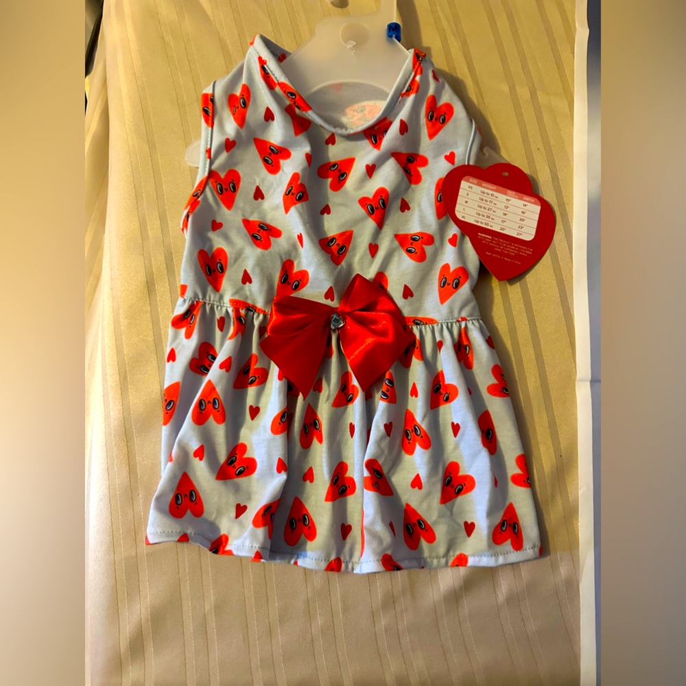 NWT Pet Apparel dress in size med with red smiley hearts on a blue background